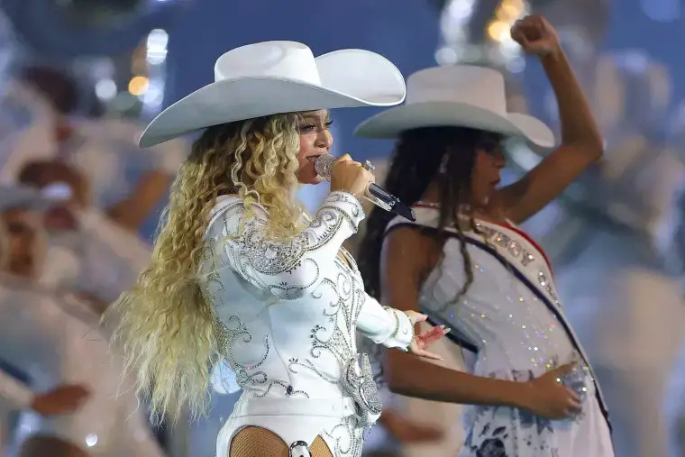 Ravens-Texans: Beyoncé Facing Massive Backlash After "Disgusting" Act On Stage (Report) 3 Beyoncé performs with daughter, Blue Ivy, during the halftime show for the game between the Baltimore Ravens and the Houston Texans at NRG Stadium on Dec. 25, 2024 in Houston, Texas.