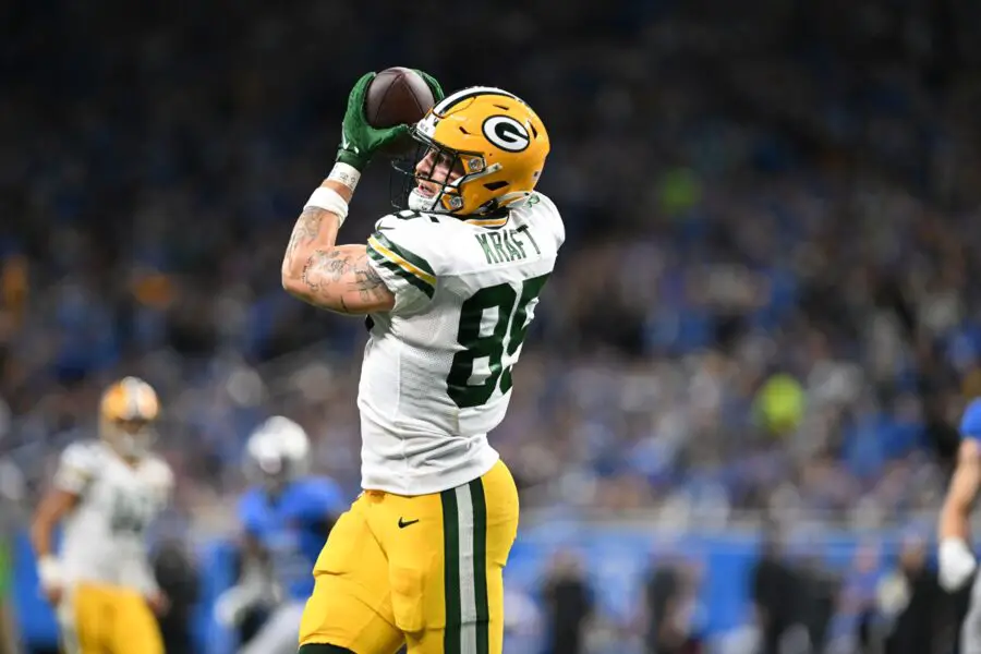 Nov 23, 2023; Detroit, Michigan, USA; Green Bay Packers tight end Tucker Kraft (85) catches a touchdown pass from quarterback Jordan Love (10) (not pictured) against the Detroit Lions in the first quarter at Ford Field. Mandatory Credit: Lon Horwedel-USA TODAY Sports