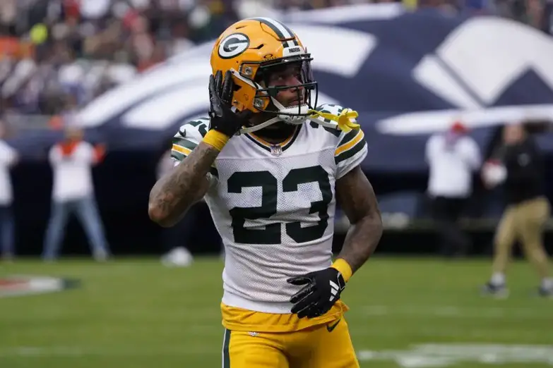 Nov 17, 2024; Chicago, Illinois, USA; Green Bay Packers cornerback Jaire Alexander (23) gestures to the fans before the game against the Chicago Bears at Soldier Field. Mandatory Credit: David Banks-Imagn Images