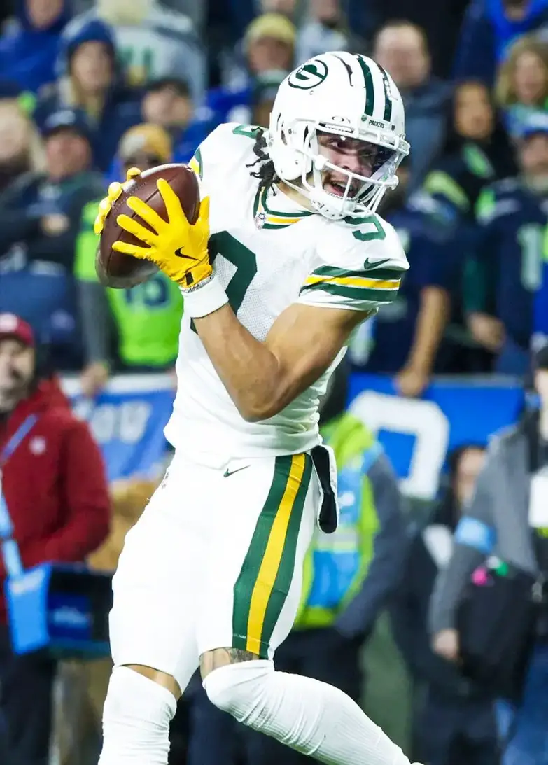 Dec 15, 2024; Seattle, Washington, USA; Green Bay Packers wide receiver Christian Watson (9) catches a pass against the Seattle Seahawks during the third quarter at Lumen Field. Mandatory Credit: Joe Nicholson