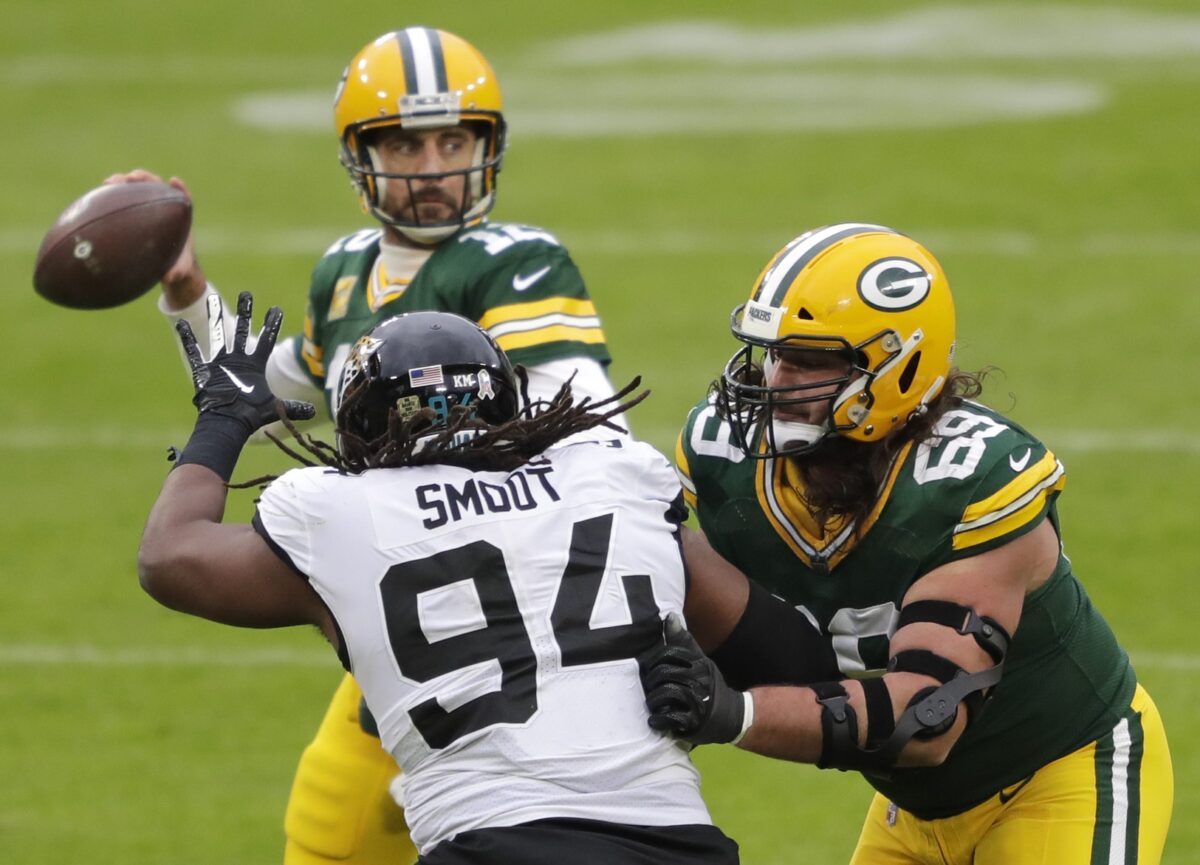 Breaking: Aaron Rodgers Snubbed Longtime Friend from Wedding, Speaks Out On Social Media (Report) 4 Green Bay Packers defensive tackle David Bakhtiari (69) blocks Jacksonville Jaguars defensive end Dawuane Smoot (94)) as quarterback Aaron Rodgers (12) looks to pass Sunday, November 15, 2020, at Lambeau Field in Green Bay, Wis.