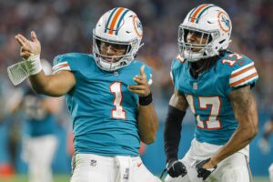 Miami Dolphins' Tua Tagovailoa Skips Voluntary Workouts Amid Contract Negotiations 1 NFL Miami Dolphins Tyreek Hill