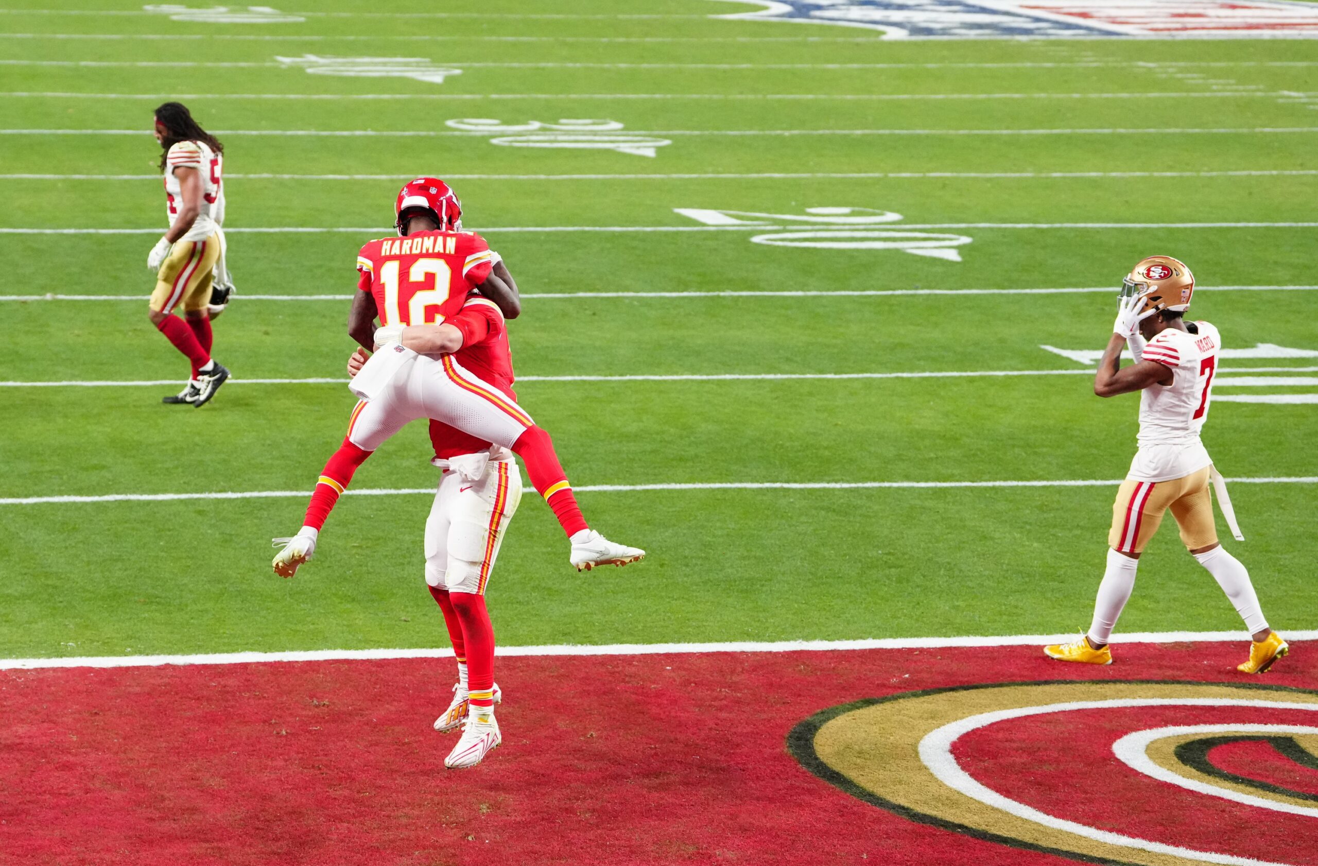 Feb 11, 2024; Paradise, Nevada, USA; Kansas City Chiefs wide receiver Mecole Hardman Jr. (12) celebrates after scoring the winning touchdown against the San Francisco 49ers during overtime in Super Bowl LVIII at Allegiant Stadium. Mandatory Credit: Stephen R. Sylvanie-USA TODAY Sports Bears