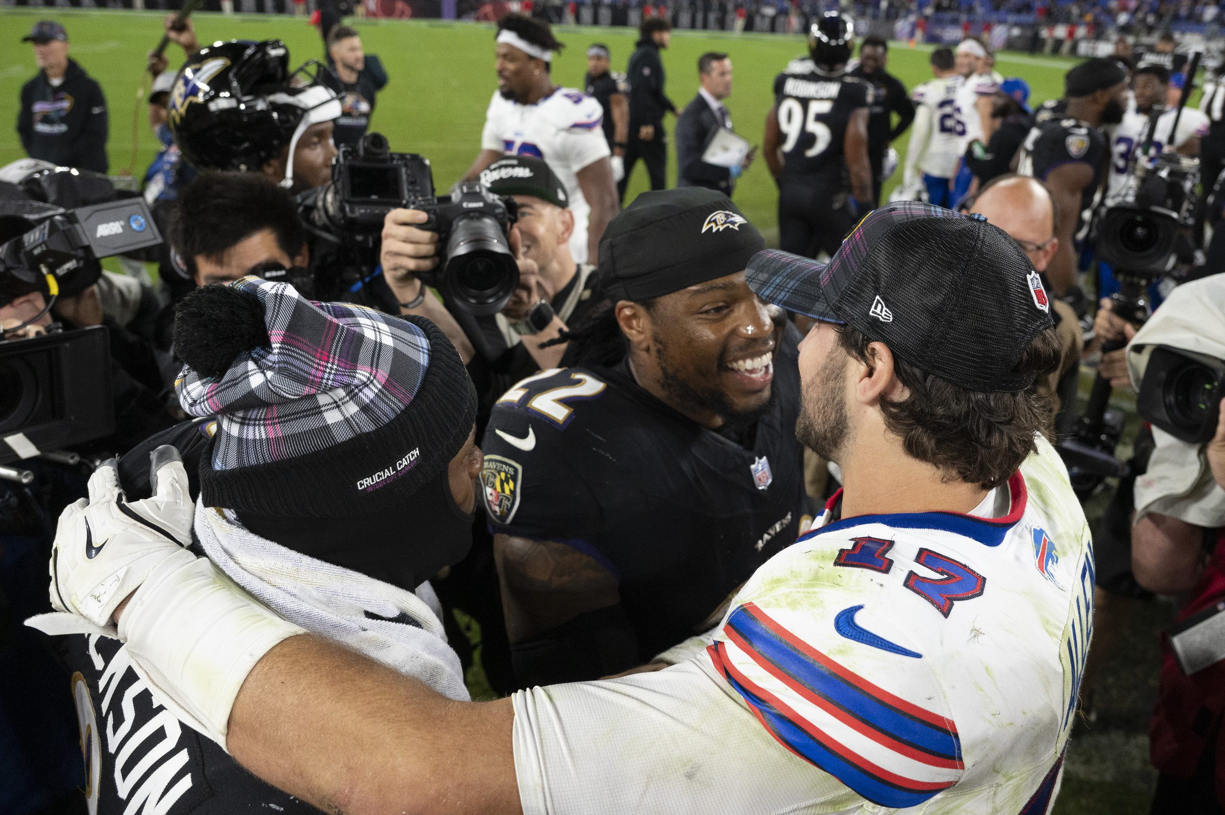 Sep 29, 2024; Baltimore, Maryland, USA; Buffalo Bills quarterback Josh Allen (17) speaks with Baltimore Ravens running back Derrick Henry (22) and quarterback Lamar Jackson (8) after the game during the second half at M&T Bank Stadium. Mandatory Credit: Tommy Gilligan-Imagn Images