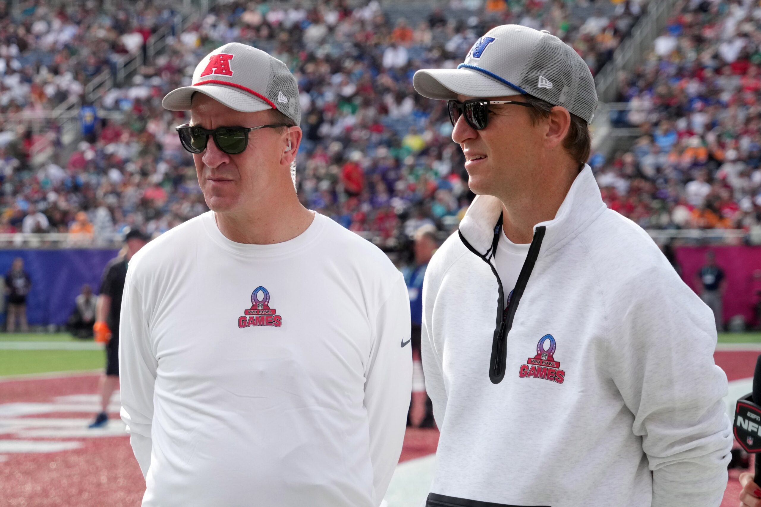 "We Both Live Dangerously": Petyon Manning Compares Himself To Tom Cruise After Watching Mission Impossible - The Final Reckoning 2 coach Peyton Manning (left) and brother and NFC coach Eli Manning