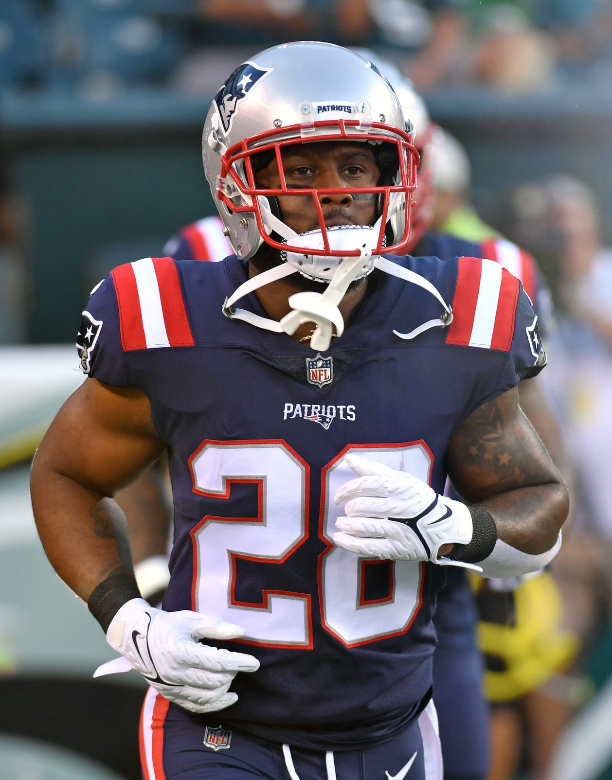 Aug 19, 2021; Philadelphia, Pennsylvania, USA; New England Patriots running back James White (28) runs onto the field against the Philadelphia Eagles at Lincoln Financial Field. Mandatory Credit: Eric Hartline-USA TODAY Sports