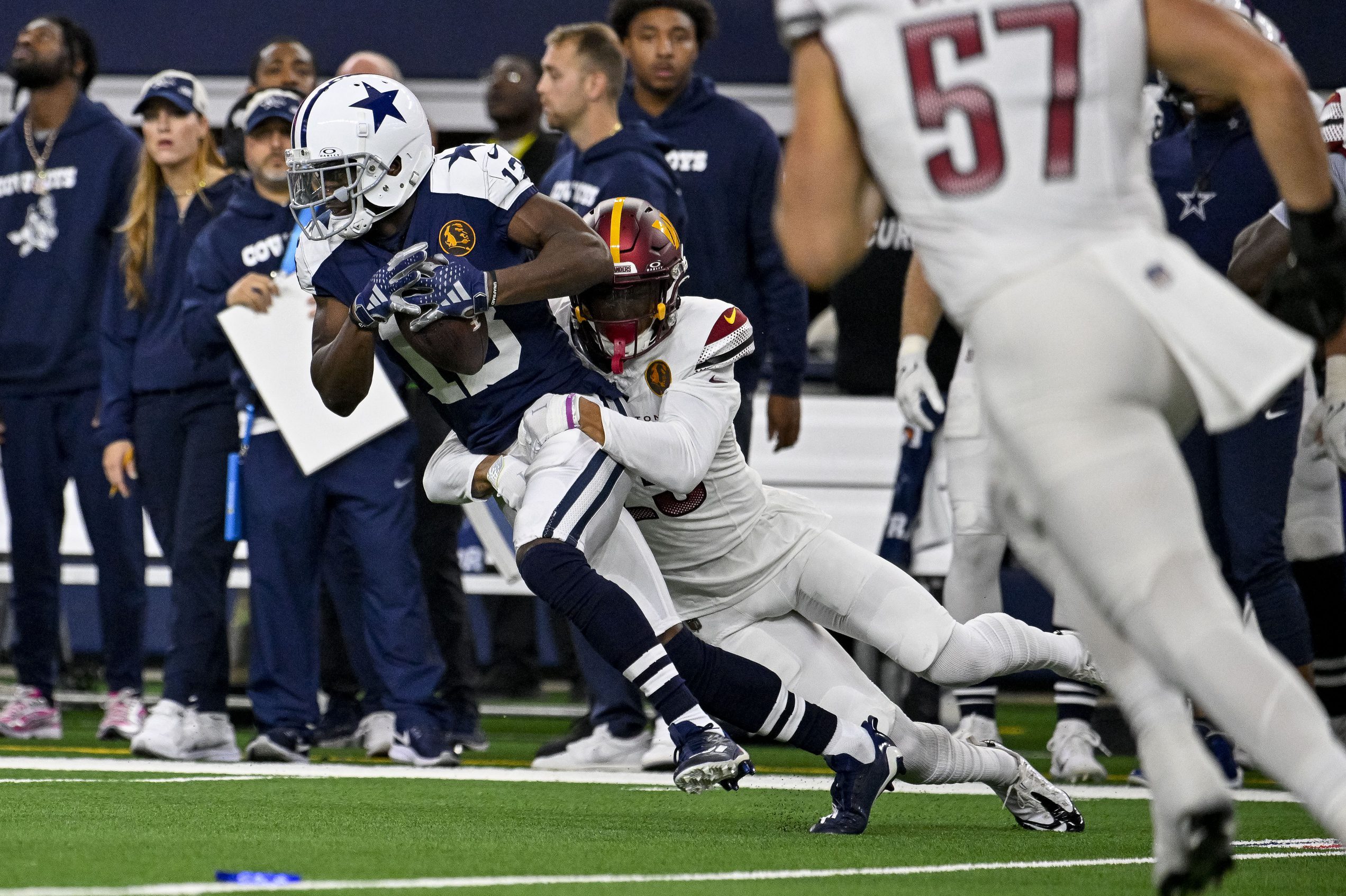 Nov 23, 2023; Arlington, Texas, USA; Dallas Cowboys wide receiver Michael Gallup (13) and Washington Commanders cornerback Benjamin St-Juste (25) in action during the game between the Dallas Cowboys and the Washington Commanders at AT&T Stadium. Mandatory Credit: Jerome Miron-USA TODAY Sports