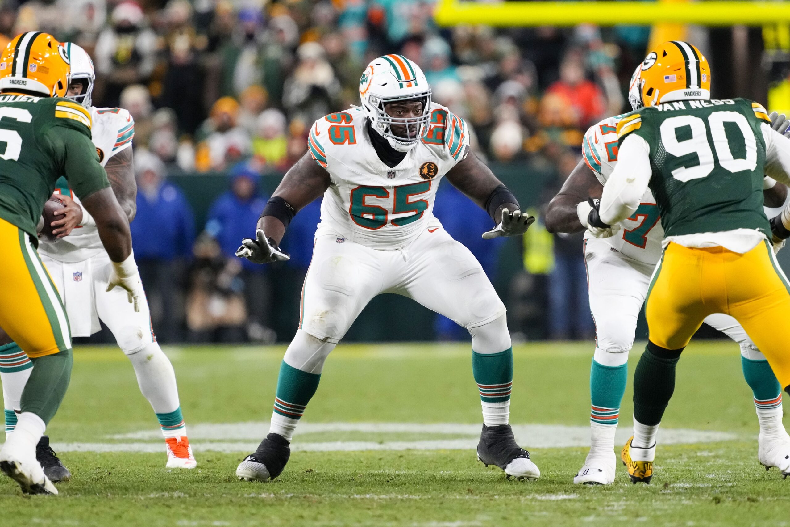 Nov 28, 2024; Green Bay, Wisconsin, USA; Miami Dolphins offensive linenam Robert Jones (65) during the game against the Green Bay Packers at Lambeau Field. Mandatory Credit: Jeff Hanisch-Imagn Images