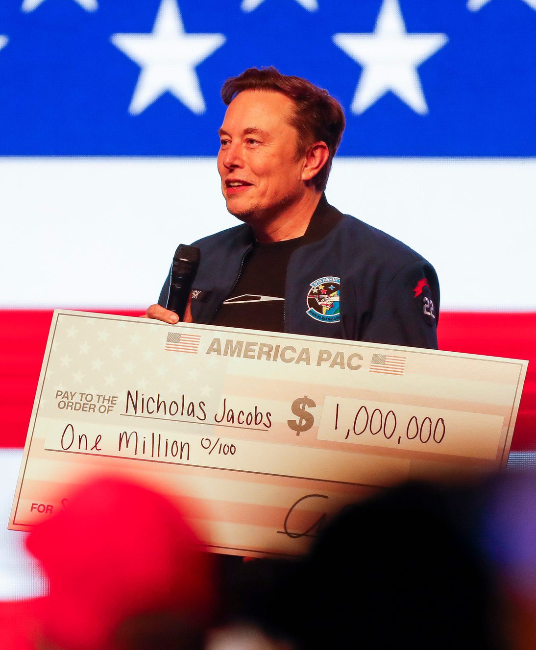 Breaking: NFL Legend Has Twitter (X) Account Revoked By Elon Musk After Massive Beef Goes Too Far 1 Billionaire Elon Musk presents a check for $1 million made out to Nicholas Jacobs during a town hall on Sunday, March 30, 2025, at the KI Convention Center in Green Bay, Wis. Musk held the event to drive turnout for TuesdayÕs state Supreme Court election between Brad Schimel and Susan Crawford. Tork Mason/USA TODAY NETWORK-Wisconsin NFL