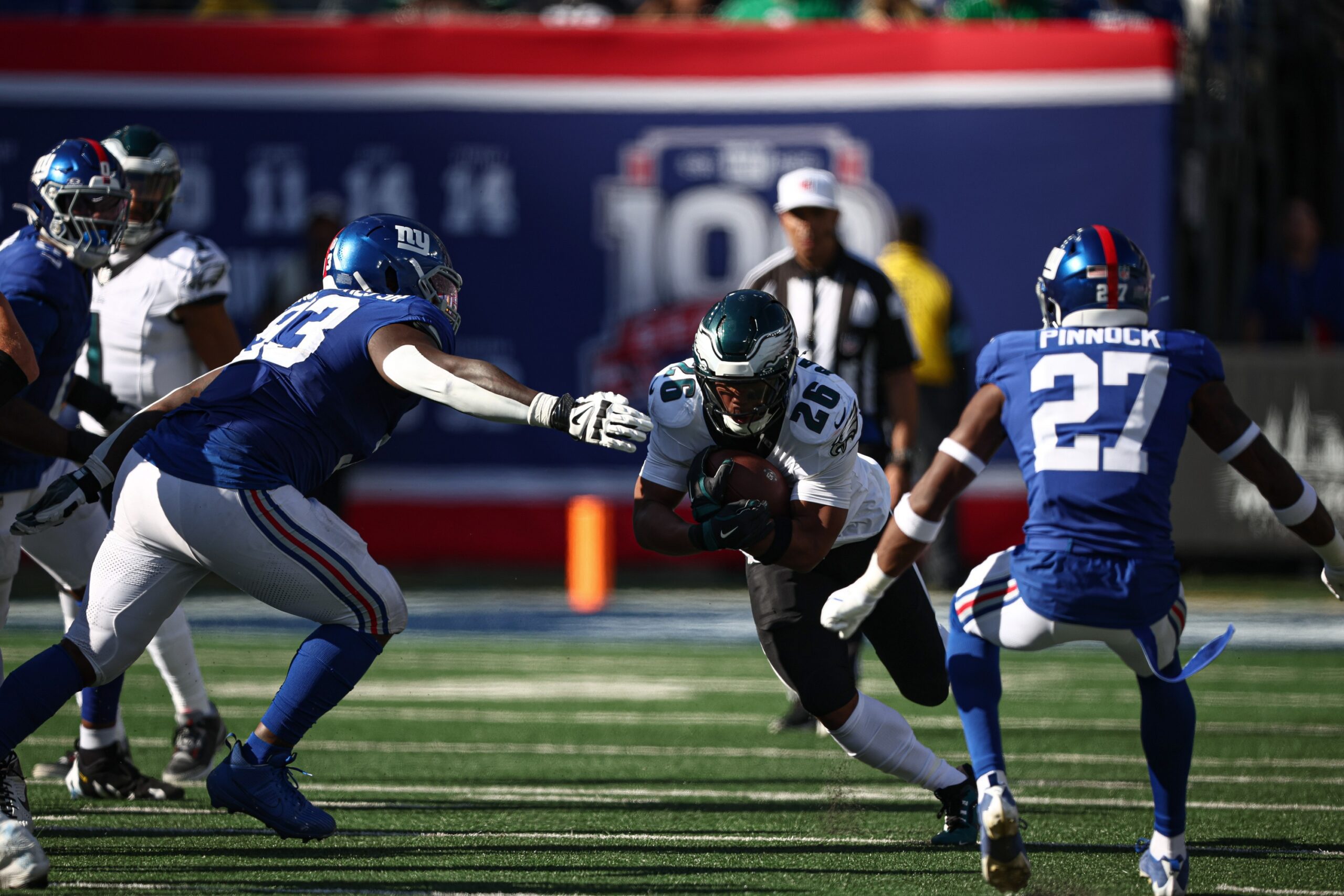 Oct 20, 2024; East Rutherford, New Jersey, USA; Philadelphia Eagles running back Saquon Barkley (26) carries the ball against the New York Giants during the second half at MetLife Stadium. Mandatory Credit: Vincent Carchietta-Imagn Images