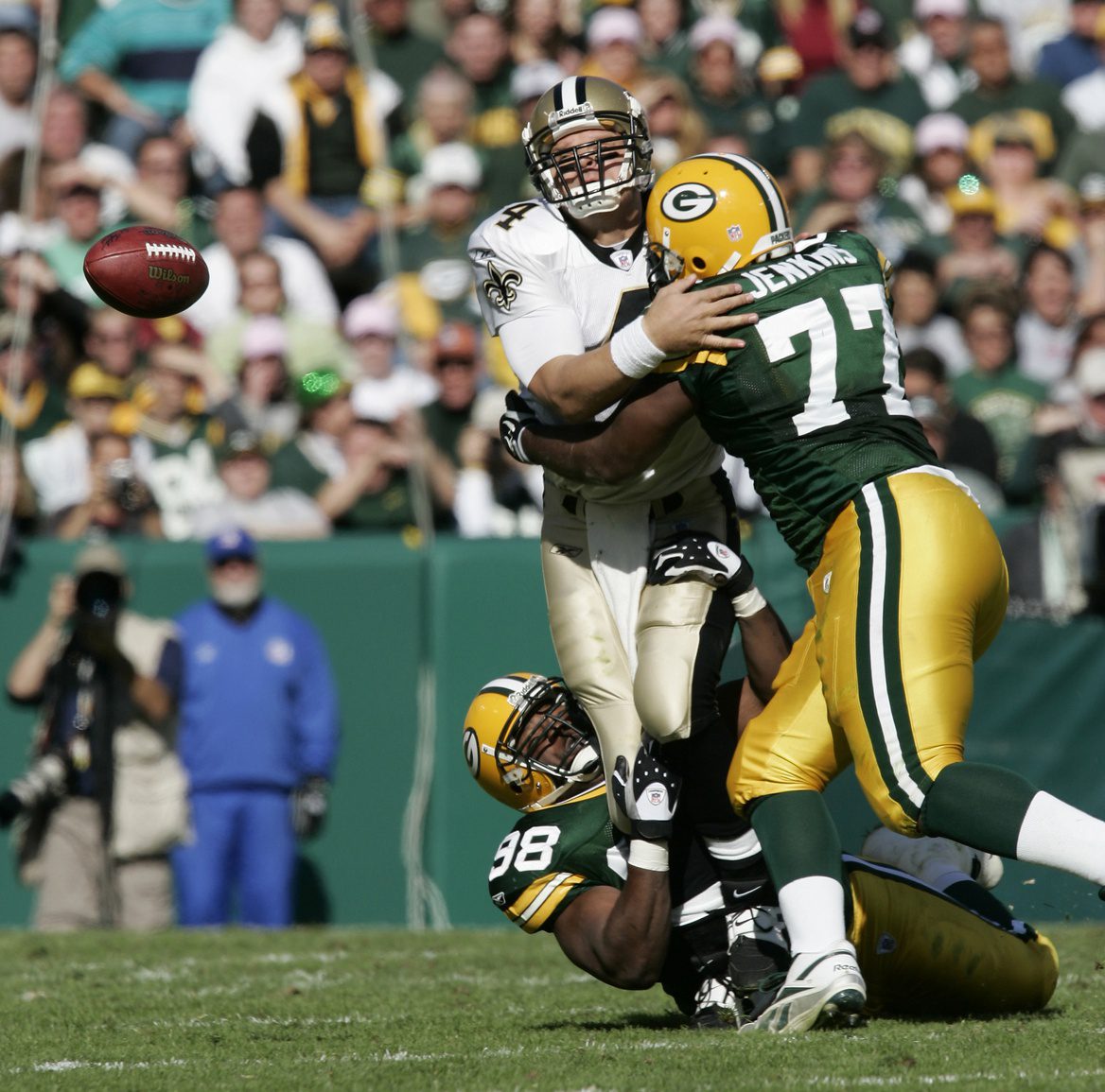 Former Packers Star Spit On, Brawl Ensues In The Street (Watch) 2 October 9, 2005; Green Bay, WI, USA; Kenny Peterson #98 and Cullen Jenkins #77 of the Green Bay Packers force the fumble as they sack Todd Bouman #4 of the New Orleans Saints during the third quarter at Lambeau Field. Mandatory Credit: Photo By Jeff Hanisch-Imagn Images Copyright (c) 2005 Jeff Hanisch