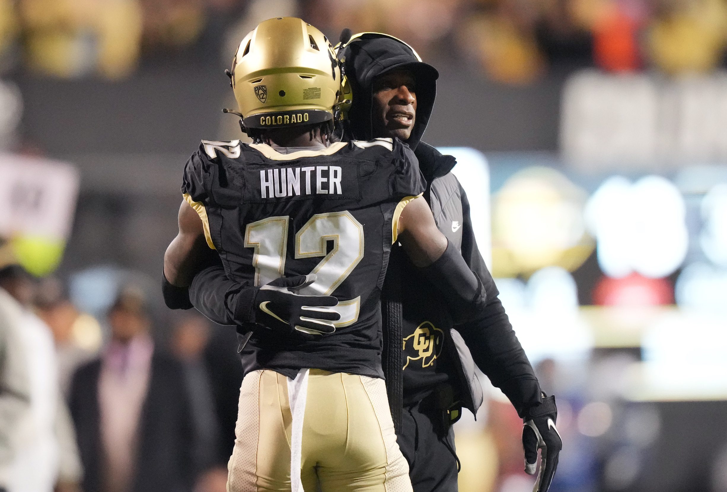 Deion Sanders Takes Direct Shot At Travis Hunter's Fiancée Right Before Wedding 2 Oct 13, 2023; Boulder, Colorado, USA; Colorado Buffaloes wide receiver Travis Hunter (12) is congratulated for his touchdown by head coach Deion Sanders in the first quarter against the Stanford Cardinal at Folsom Field. Mandatory Credit: Ron Chenoy-Imagn Images
