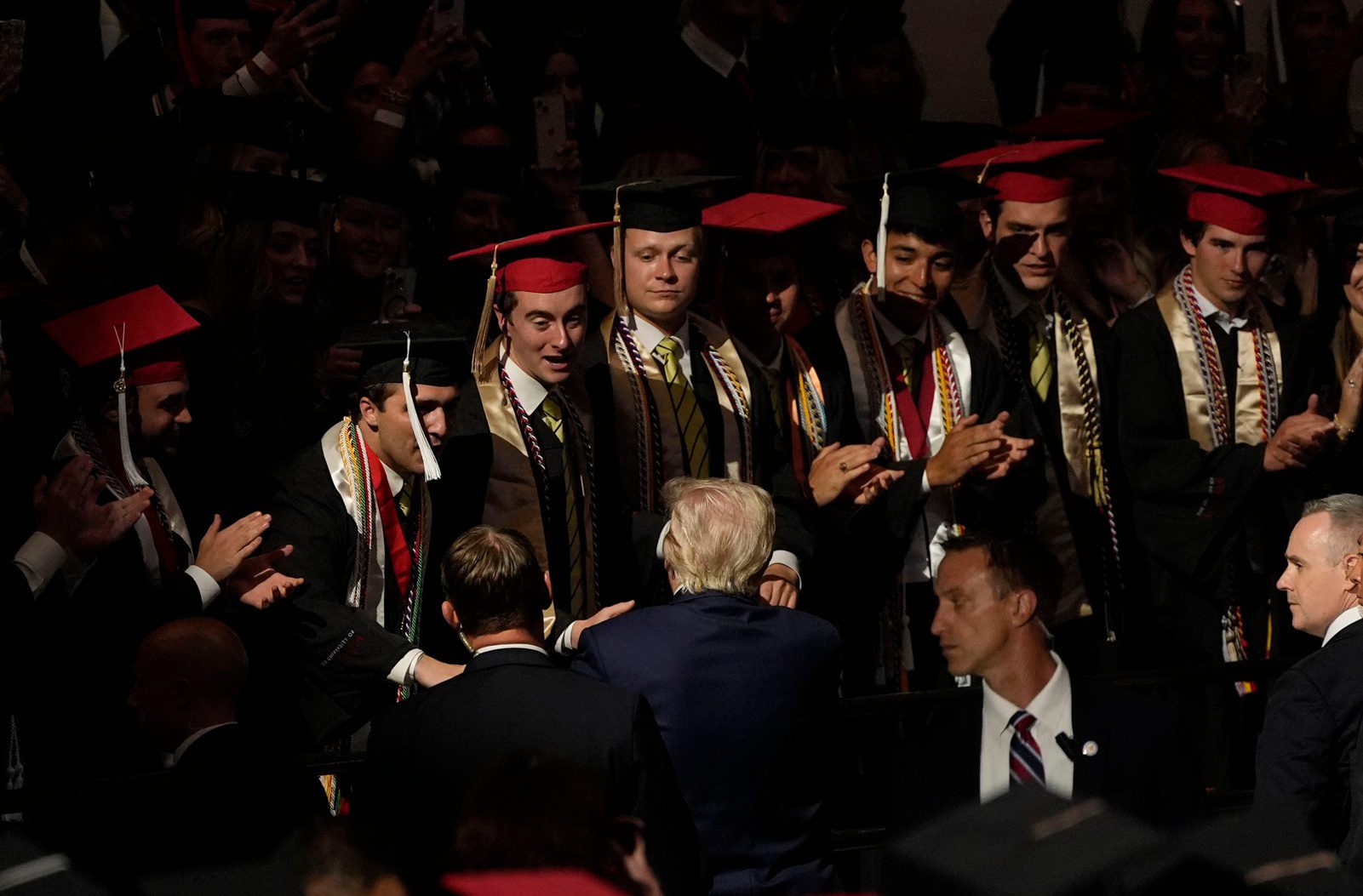 "I Can't Get Hit" Donald Trump Mocks Democrats Over Transgender Athletes (Report) 4 President Donald Trump delivers a special commencement address to University of Alabama graduates at Coleman Coliseum. Graduation occurs over the weekend. Trump shakes hands with several graduates as he exits the venue. © Gary Cosby Jr. / USA TODAY NETWORK via Imagn Images