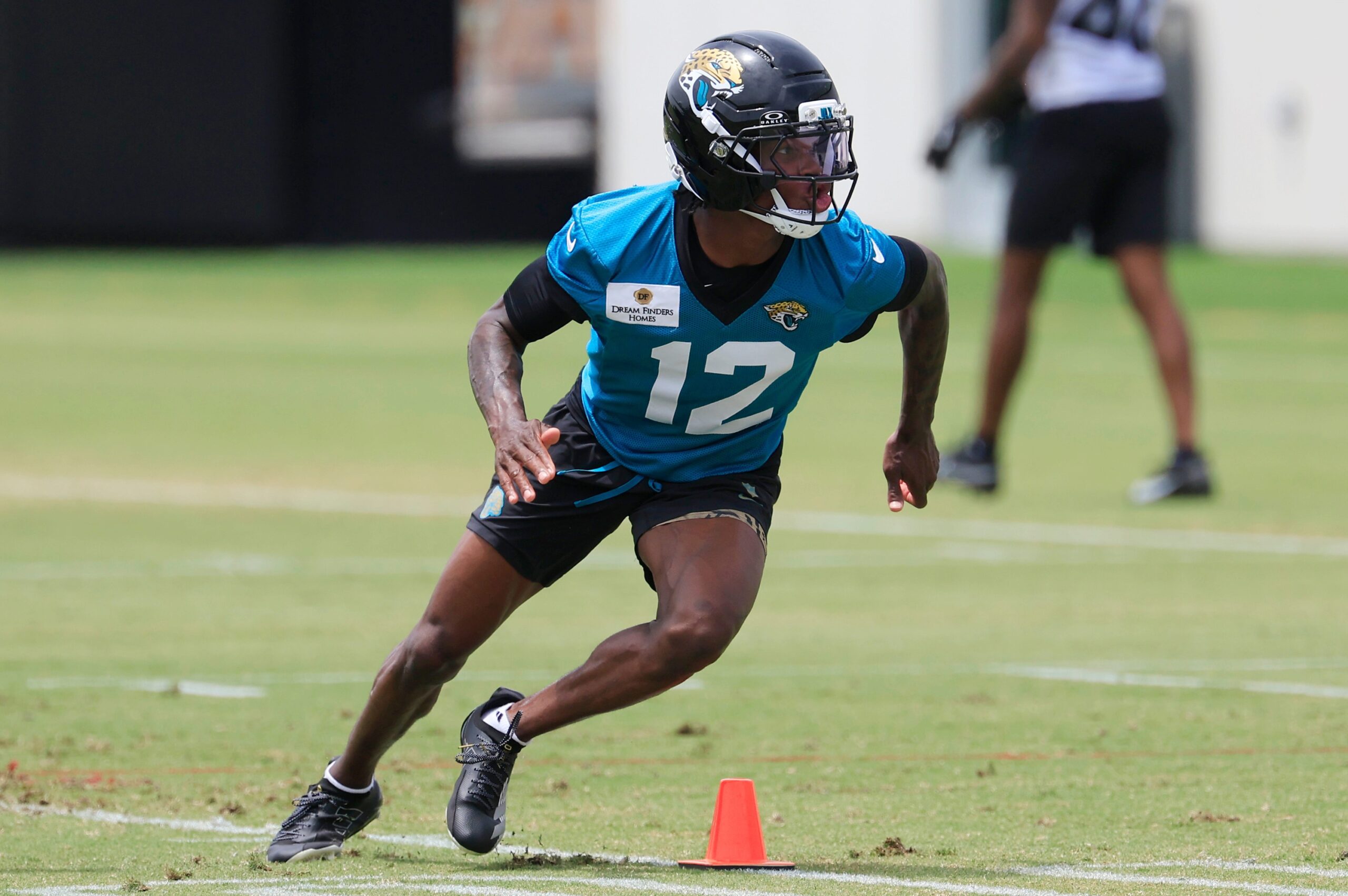 "A Couple Of Missed Assignments": Travis Hunter's Camp Performance Gets Honest Opinion From Jaguars HC Liam Coen 2 Jacksonville Jaguars wide receiver Travis Hunter (12) walks to his lane during the first organized team activity at Miller Electric Center Monday, May 19, 2025 in Jacksonville, Fla.