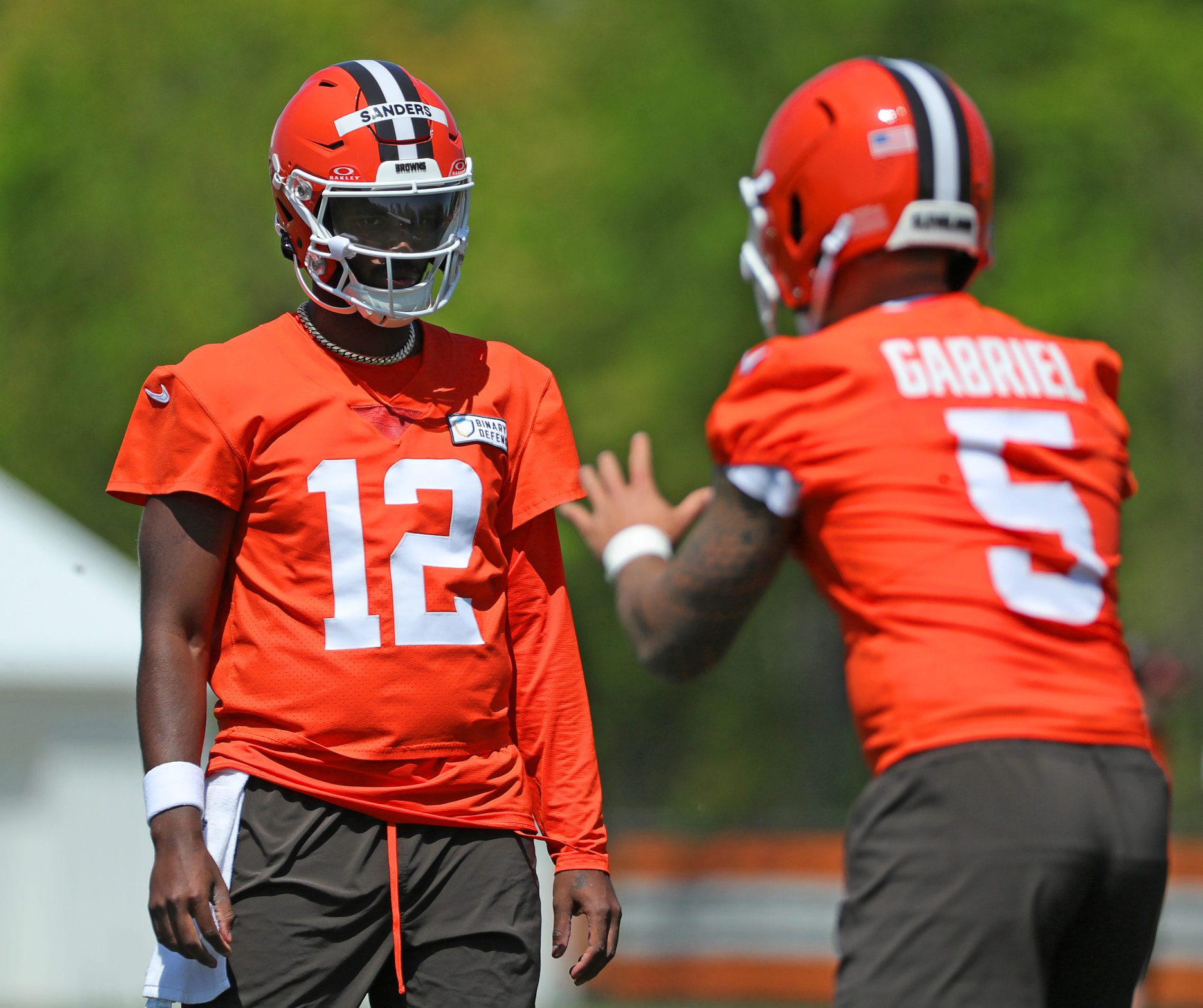 Breaking: Browns Already On The Verge Of Huge Quarterback Trade (Report) 3 Cleveland Browns quarterback Shedeur Sanders (12) watches quarterback Dillon Gabriel (5) during day two of NFL rookie minicamp at the Cleveland Browns training facility on Saturday, May 10, 2025, in Berea, Ohio. © Jeff Lange / USA TODAY NETWORK via Imagn Images