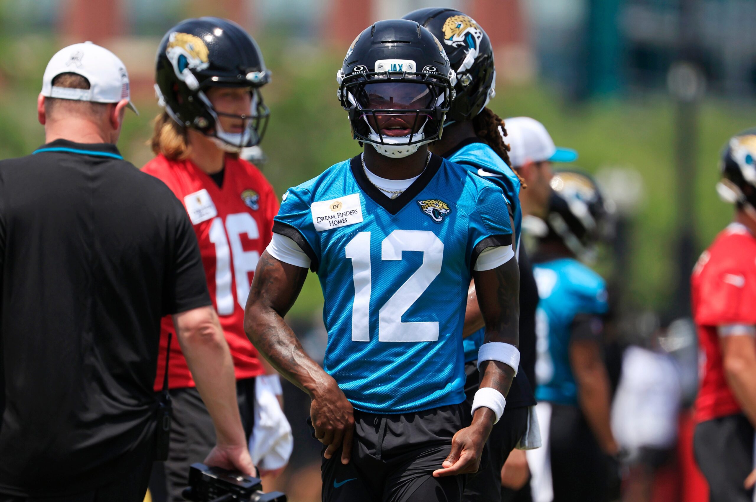 "A Couple Of Missed Assignments": Travis Hunter's Camp Performance Gets Honest Opinion From Jaguars HC Liam Coen 1 Jacksonville Jaguars wide receiver Travis Hunter (12) walks to his lane during the first organized team activity at Miller Electric Center Monday, May 19, 2025 in Jacksonville, Fla.