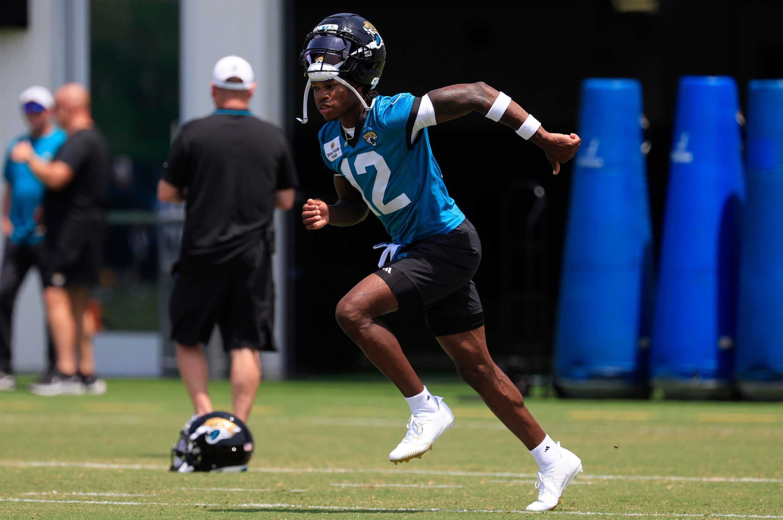 "A Couple Of Missed Assignments": Travis Hunter's Camp Performance Gets Honest Opinion From Jaguars HC Liam Coen 3 Jacksonville Jaguars wide receiver Travis Hunter (12) walks to his lane during the first organized team activity at Miller Electric Center Monday, May 19, 2025 in Jacksonville, Fla.