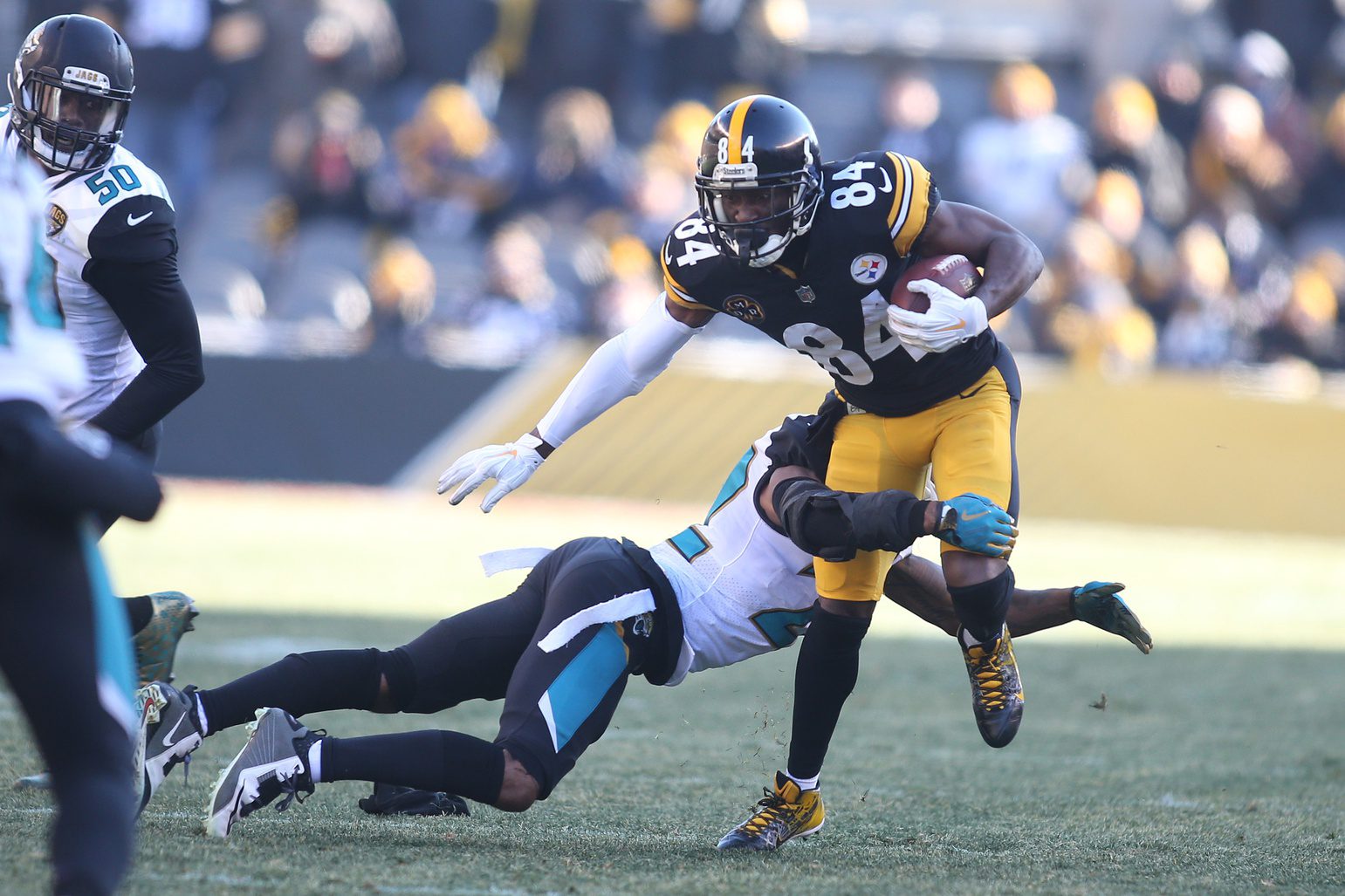 Antonio Brown Places Blame On New Suspect Amid Attempted Murder Charges (Report) 2 Jan 14, 2018; Pittsburgh, PA, USA; Pittsburgh Steelers wide receiver Antonio Brown (84) carries the ball as Jacksonville Jaguars cornerback Aaron Colvin (22) tackles during the second quarter in the AFC Divisional Playoff game at Heinz Field. Mandatory Credit: Charles LeClaire-Imagn Images