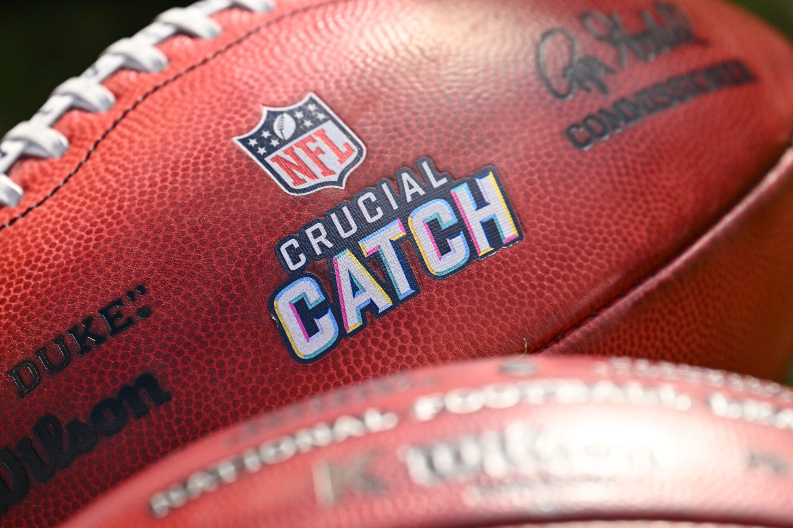The Shocking Arrest Of 1 Former College Football Star-Turned Country Music Star Goes Viral 1 Oct 15, 2023; Chicago, Illinois, USA; A close-up view of footballs with the Crucial Catch logo during an NFL game between the Minnesota Vikings and the Chicago Bears at Soldier Field. Mandatory Credit: Jamie Sabau-Imagn Images