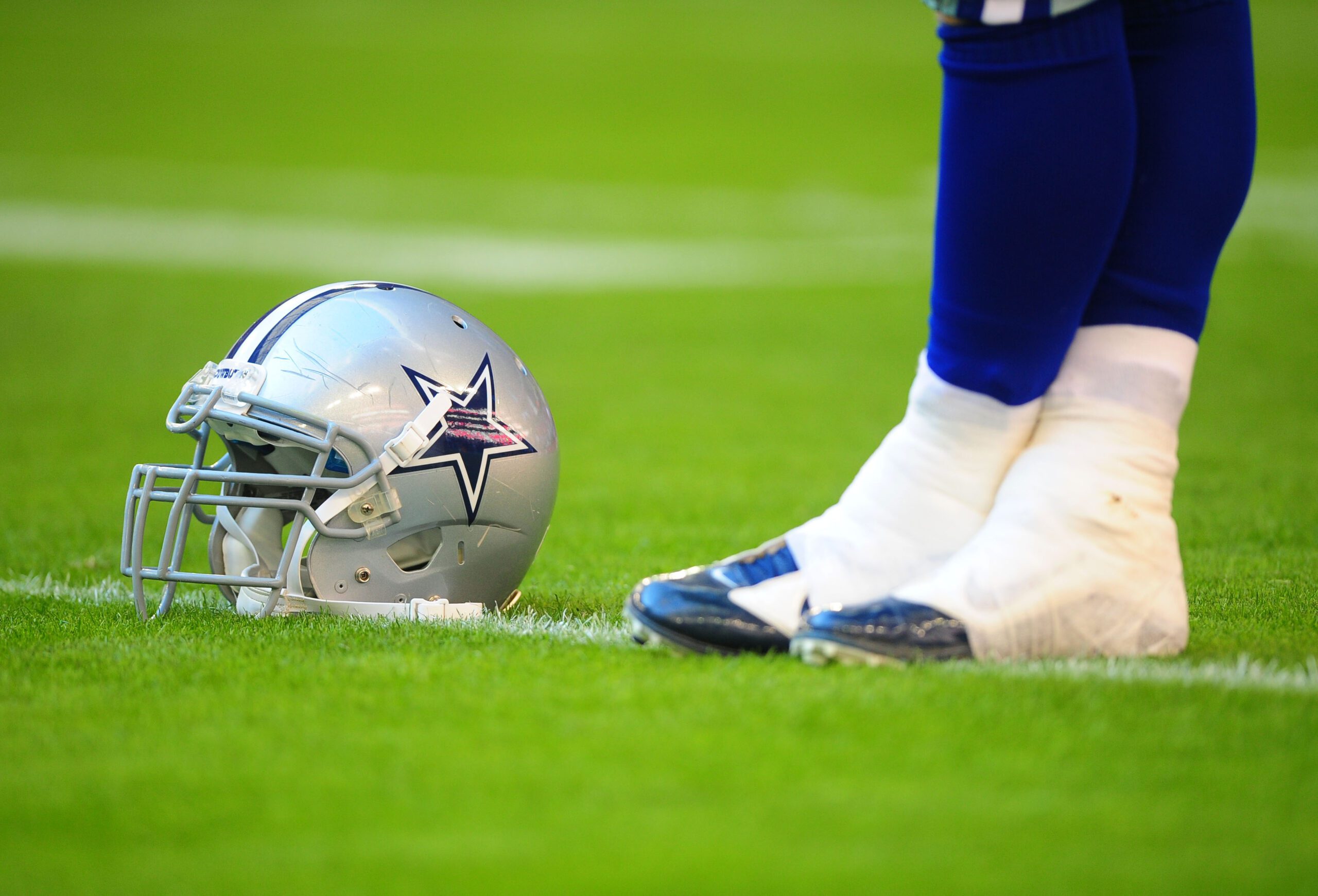 "Consistent With A Physical Altercation" Former Cowboys Starter Sees Things Get A Whole Lot Worse For Him 1 Dec. 4, 2011; Glendale, AZ, USA; Detailed view of a Dallas Cowboys helmet on the field against the Arizona Cardinals at University of Phoenix Stadium. Mandatory Credit: Mark J. Rebilas-Imagn Images