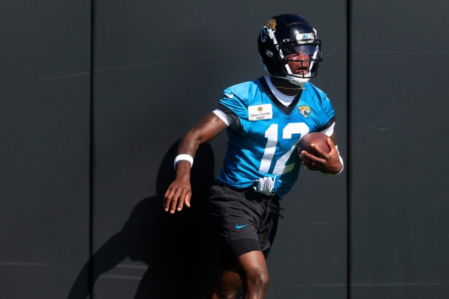 Jacksonville Jaguars wide receiver Travis Hunter (12) hits the padded wall after a sucessful reception during the second mandatory minicamp at Miller Electric Center Wednesday, June 11, 2025 in Jacksonville, Fla.