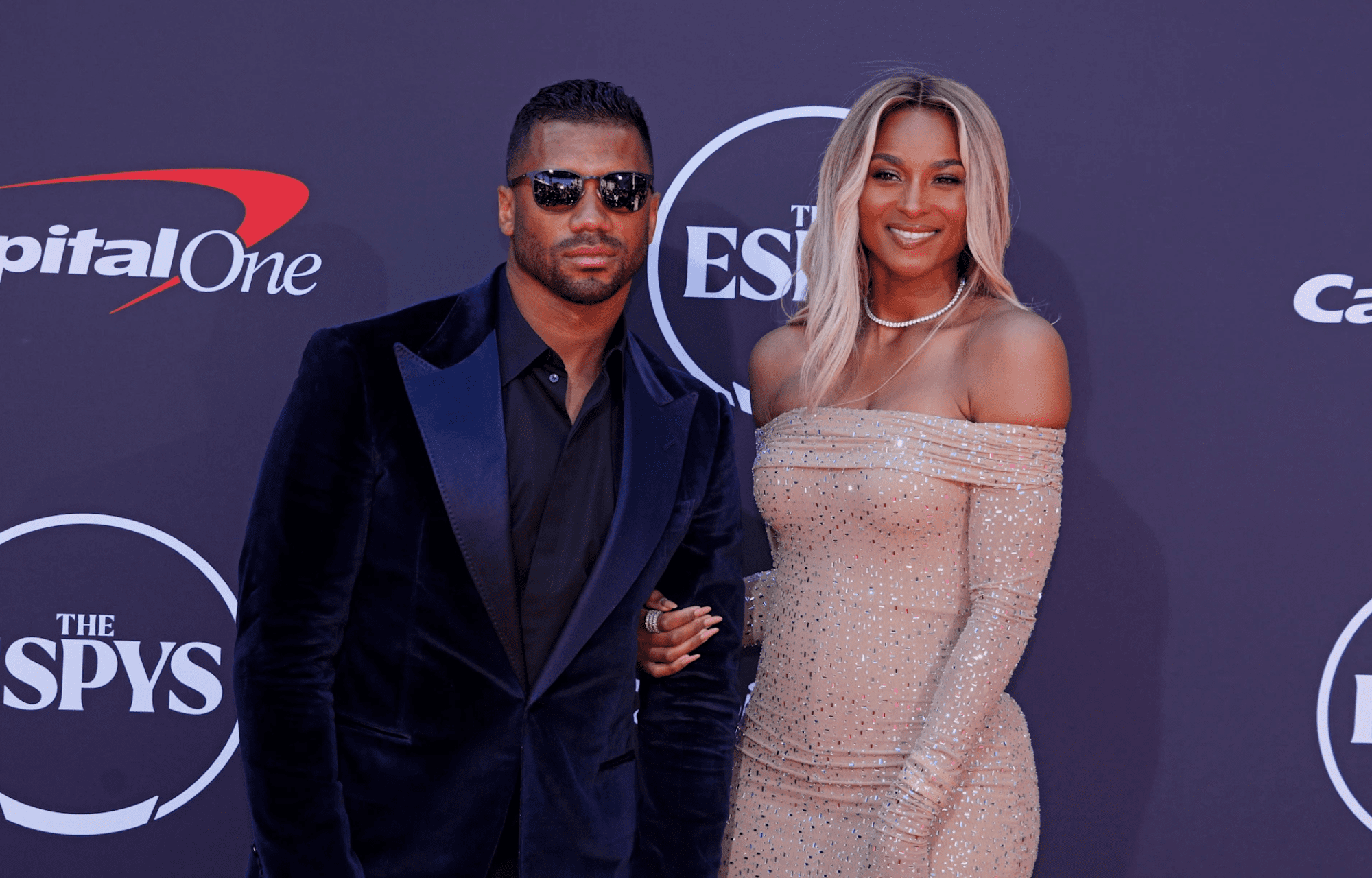 "She's With Me": Russell Wilson Can't Contain Himself As Wife Ciara Steals Spotlight At 2025 ESPYs With Ivory Outfit 1 Russell Wilson, New York Giants quarterback with wife Ciara. Credits: Sports Illustrated