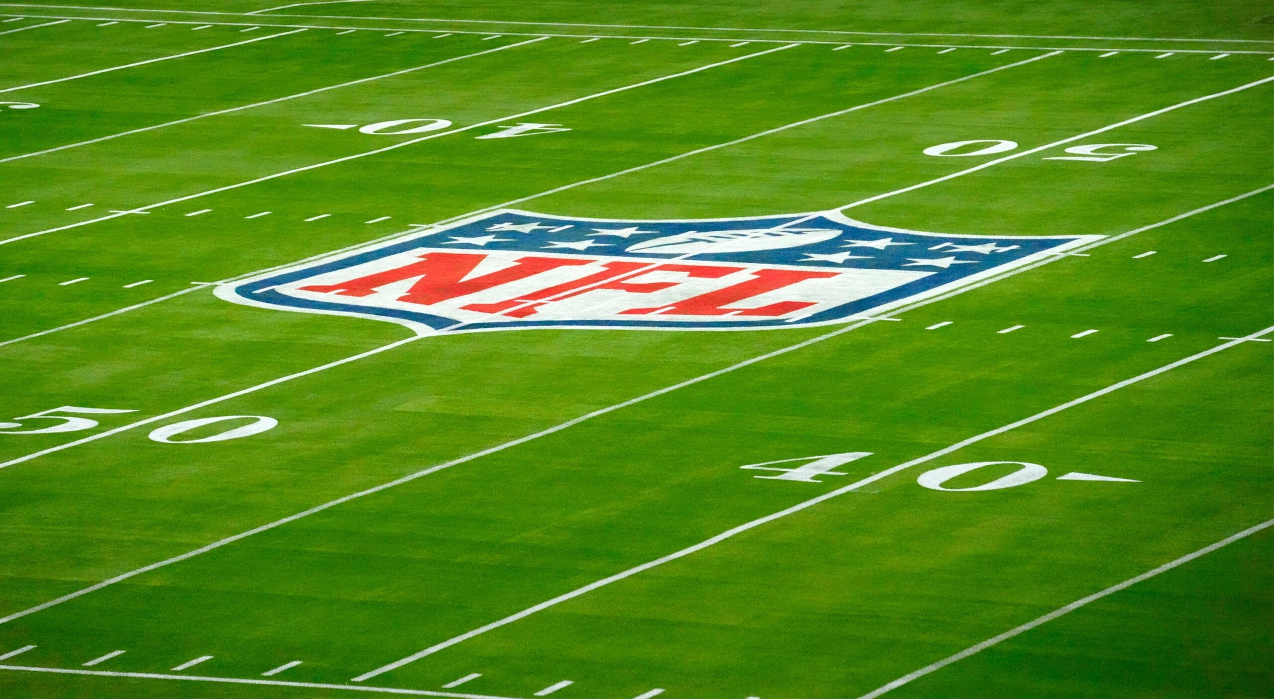 The NFL logo is seen on Jan. 31, 2023, on the field for Super Bowl LVII at State Farm Stadium. © Rob Schumacher / USA TODAY NETWORK