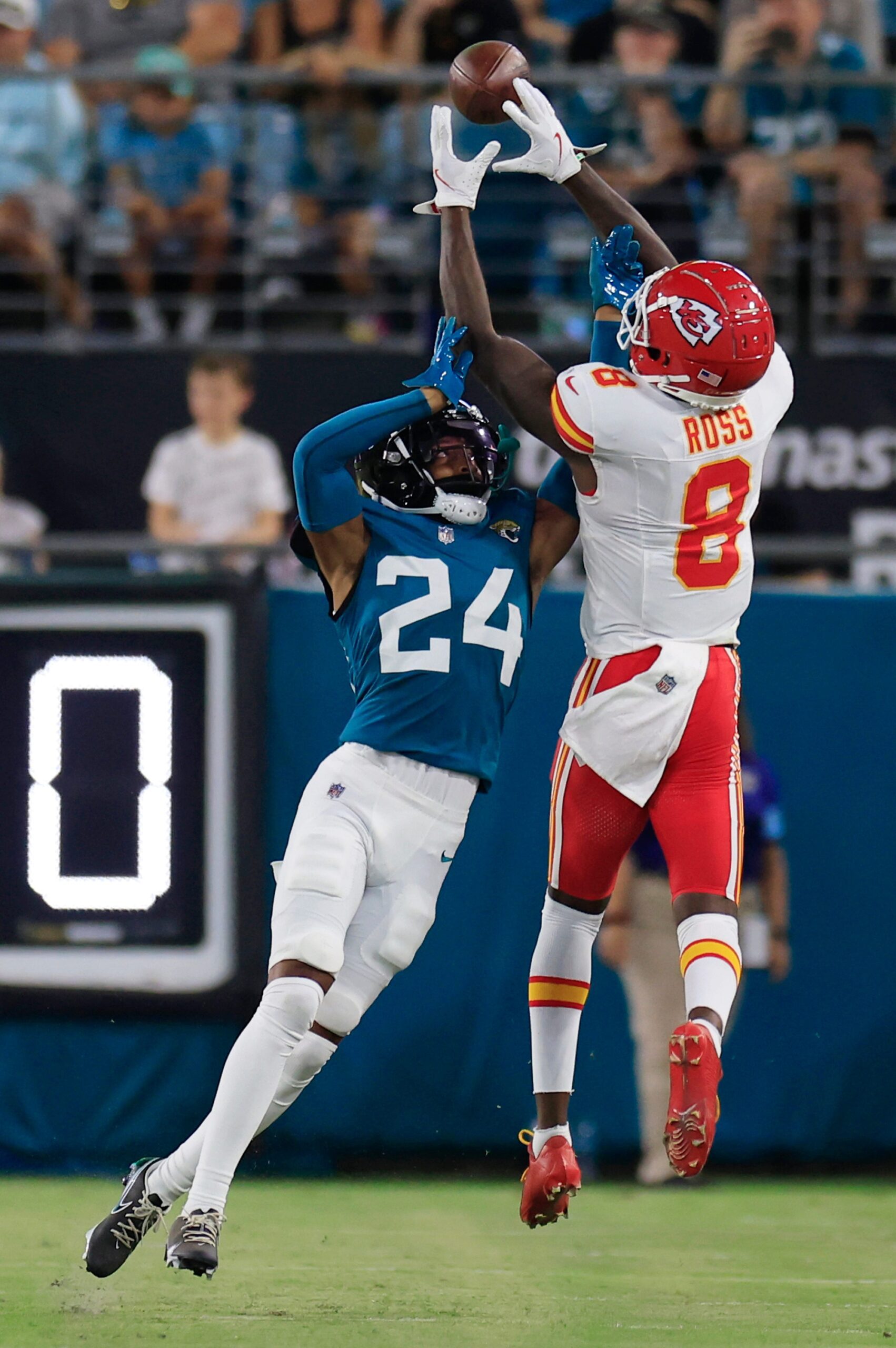 Kansas City Chiefs wide receiver Justyn Ross (8) hauls in a reception against Jacksonville Jaguars cornerback De'Antre Prince (24) during the third quarter of a preseason NFL football game Saturday, Aug. 10, 2024 at EverBank Stadium in Jacksonville, Fla. The Jacksonville Jaguars defeated the Kansas City Chiefs 26-13. [Corey Perrine/Florida Times-Union]