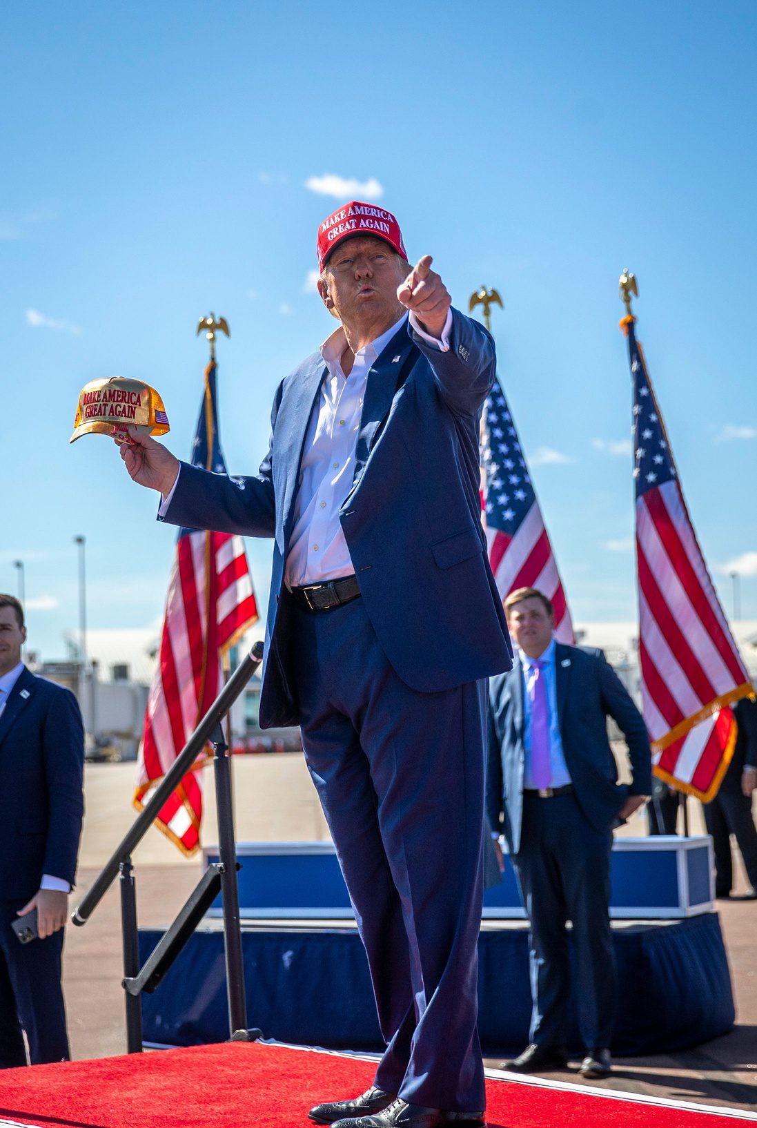 "You're A Handsome Guy" Donald Trump Awkwardly Compliments NFL Star, Fans Confused (Report) 1 Former President Donald J. Trump receives a golden ‘Make America Great Again,’ baseball cap from a young supporter (not pictured) as he walks the catwalk at the end of his rally at Central Wisconsin Airport in Mosinee, Wis. on Saturday, September 7, 2024. Gabi Broekema/USA TODAY NETWORK- Wisconsin