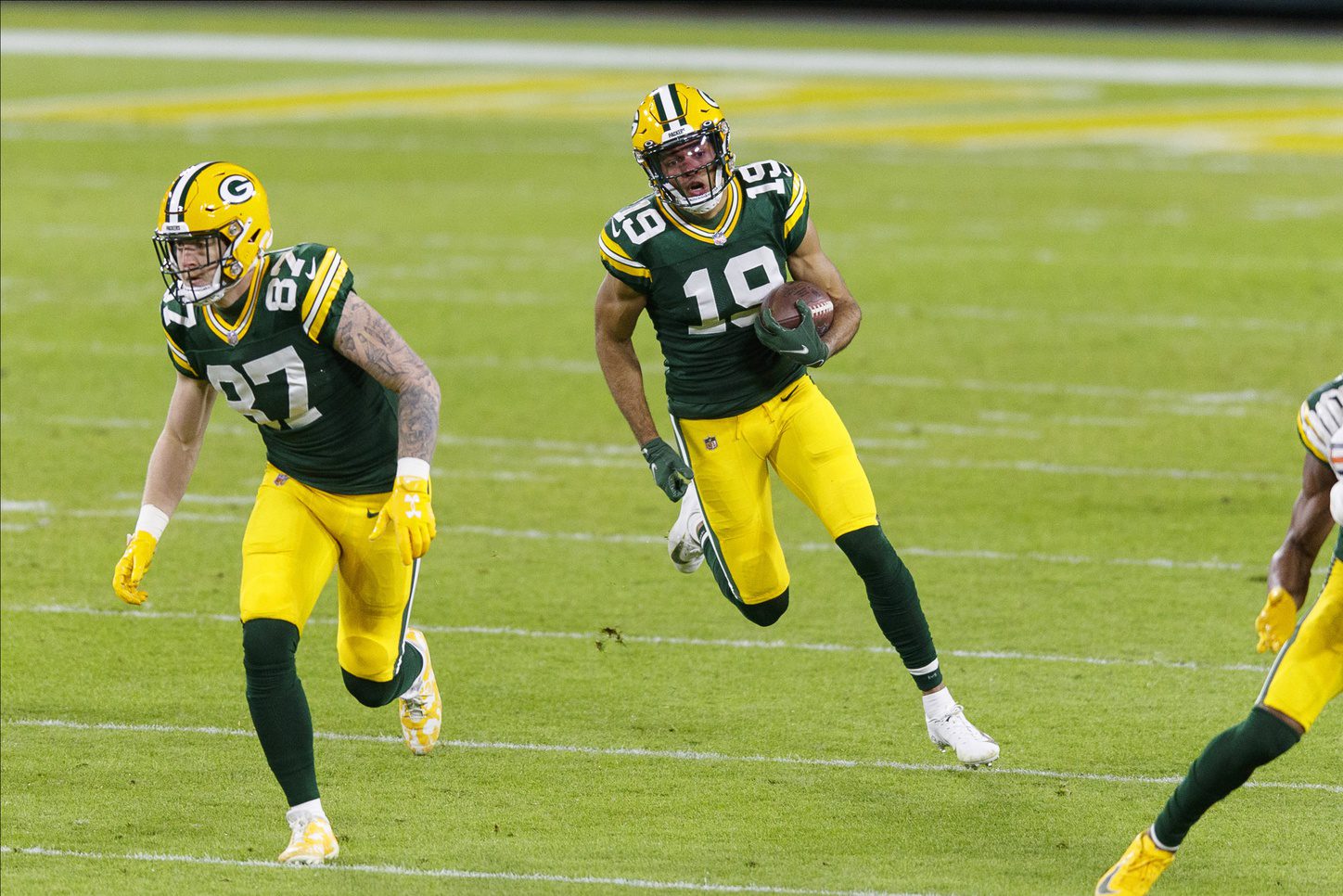 Nov 29, 2020; Green Bay, Wisconsin, USA;  Green Bay Packers wide receiver Equanimeous St. Brown (19) rushes with the football during the second quarter against the Chicago Bears at Lambeau Field. Mandatory Credit: Jeff Hanisch-USA TODAY Sports