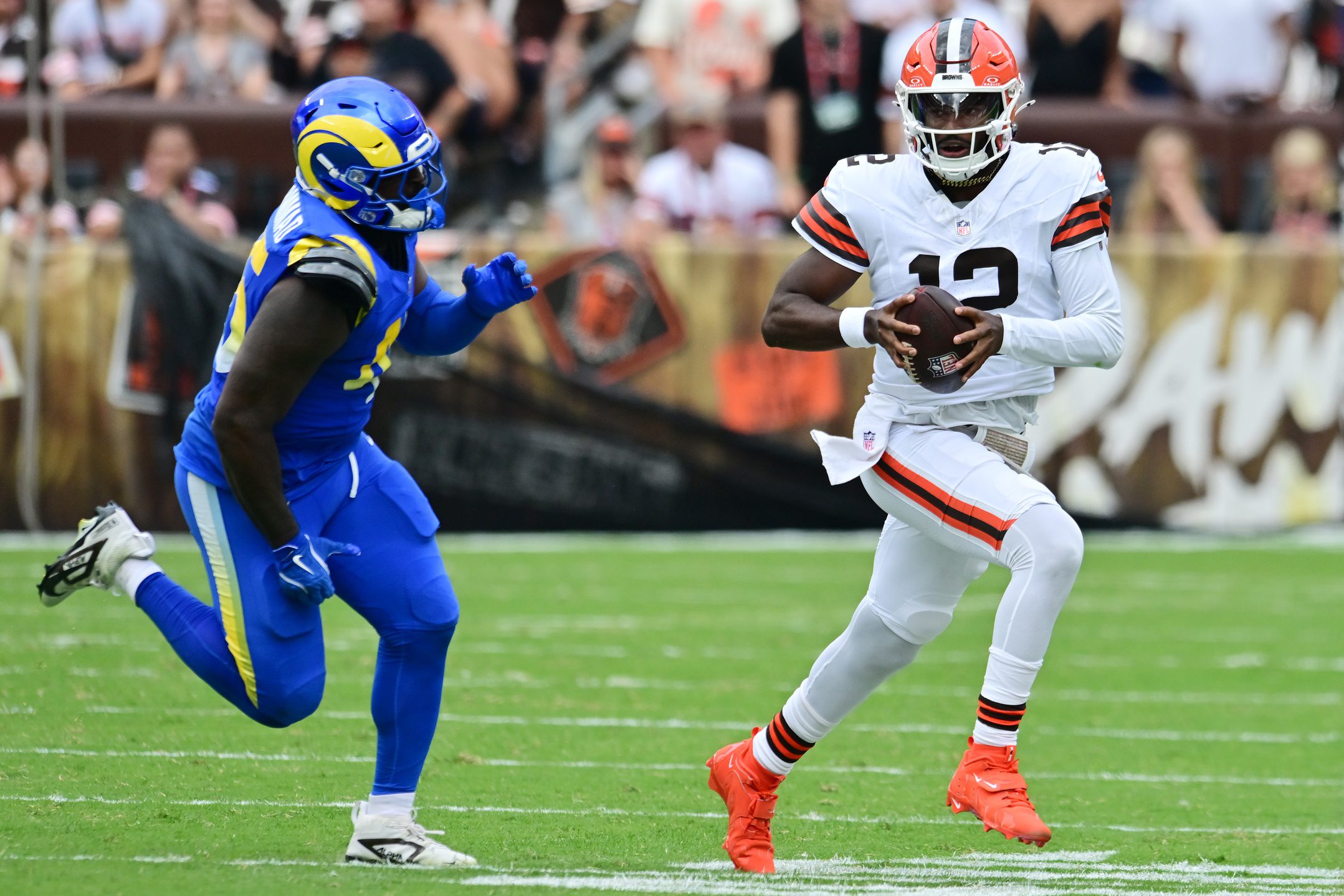 "Odd But True" Shedeur Sanders Receives Massive News About His Future With The Browns 3 Aug 23, 2025; Cleveland, Ohio, USA; Los Angeles Rams linebacker Jamil Muhammad (45) chases Cleveland Browns quarterback Shedeur Sanders (12) during the second half at Huntington Bank Field. Mandatory Credit: Ken Blaze-Imagn Images