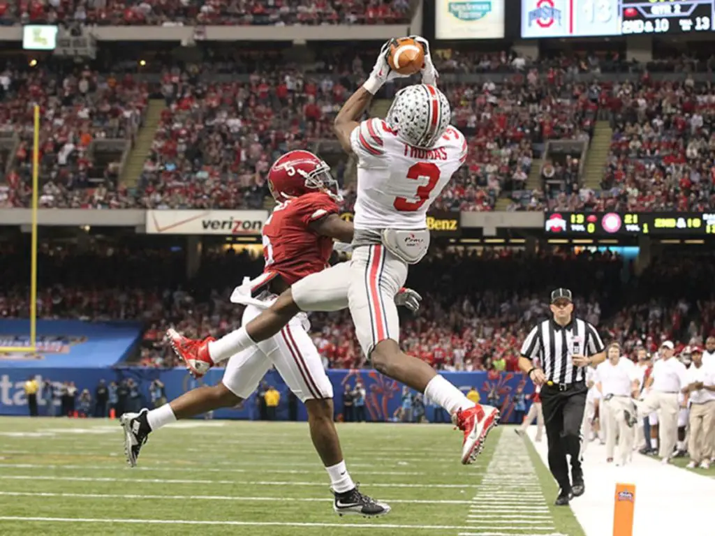 Ohio state wide receiver Michael Thomas catches a touchdown pass from wider receiver Evan Spencer.