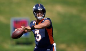Russell Wilson throwing during a Denver Broncos practice