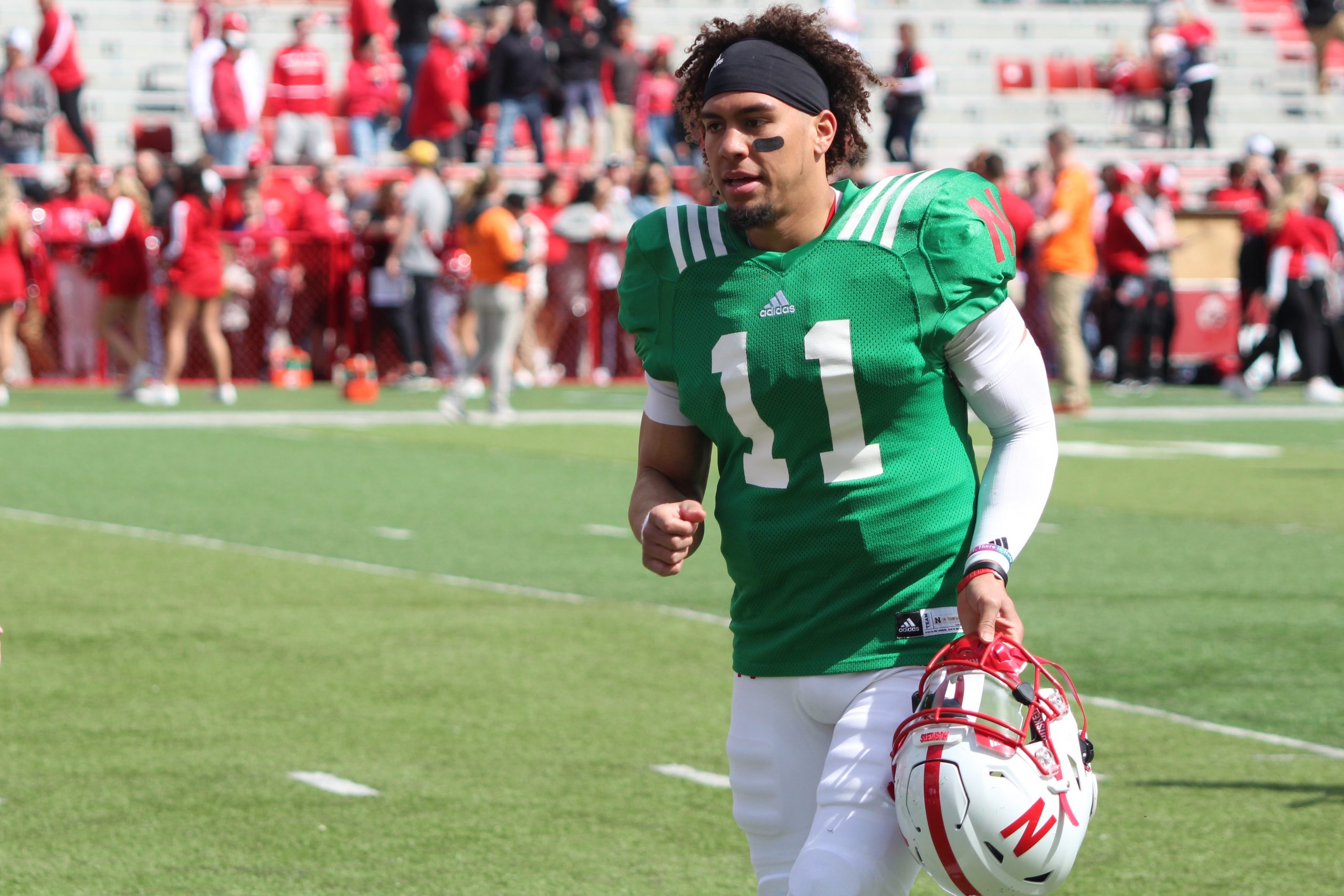 Casey Thompson leaving the field after Nebraska's red and white game