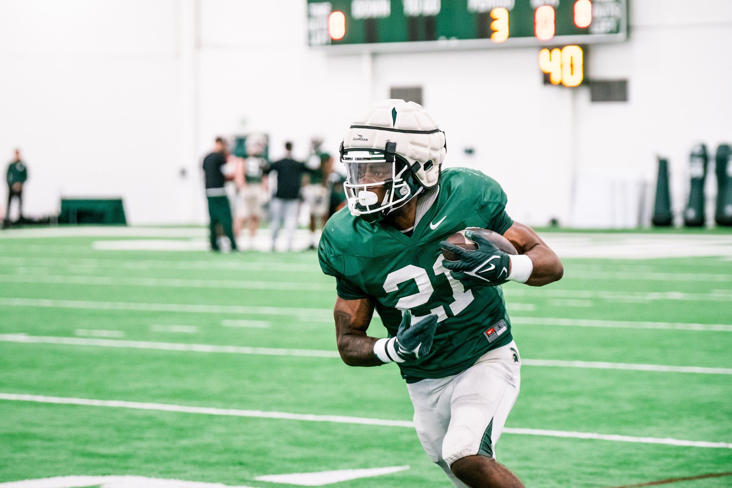 Michigan State running back Davion Primm running the ball in open practice.