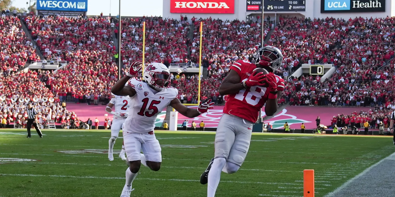 Marvin Harrison Jr. catching touchdown pass during the 21-22 Rose Bowl game.