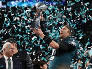 Nick Foles hoisting Super Bowl