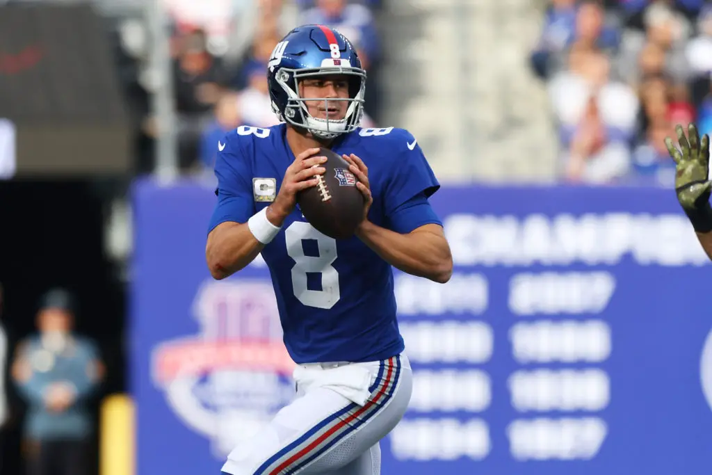 Daniel Jones moving out of the pocket in a 2021 regular season game