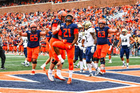Illinois Rb celebrates at touchdown during a game in 2021.
