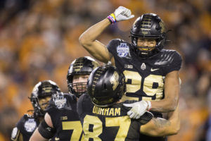 Purdue players celebrate a big touchdown in their win over Tennessee.