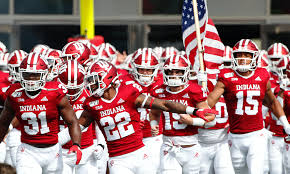 Indiana players run onto the field in 2021