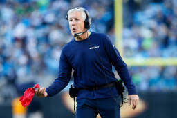 Pete Carroll with challenge flag