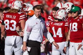 Head Coach Scott Frost walks the sideline during a game in 2021.