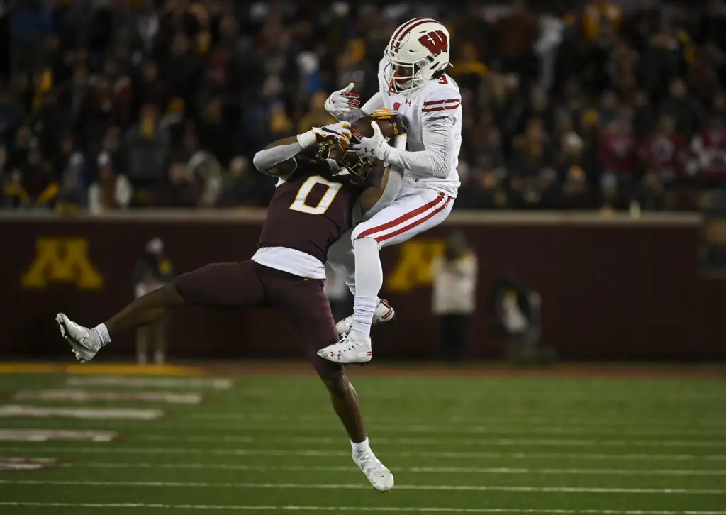 University of Minnesota Golden Gopher Cornerback Justin Walley intercepting a pass against the Wisconsin Badgers