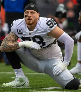 Maxx Crosby stretching before a game