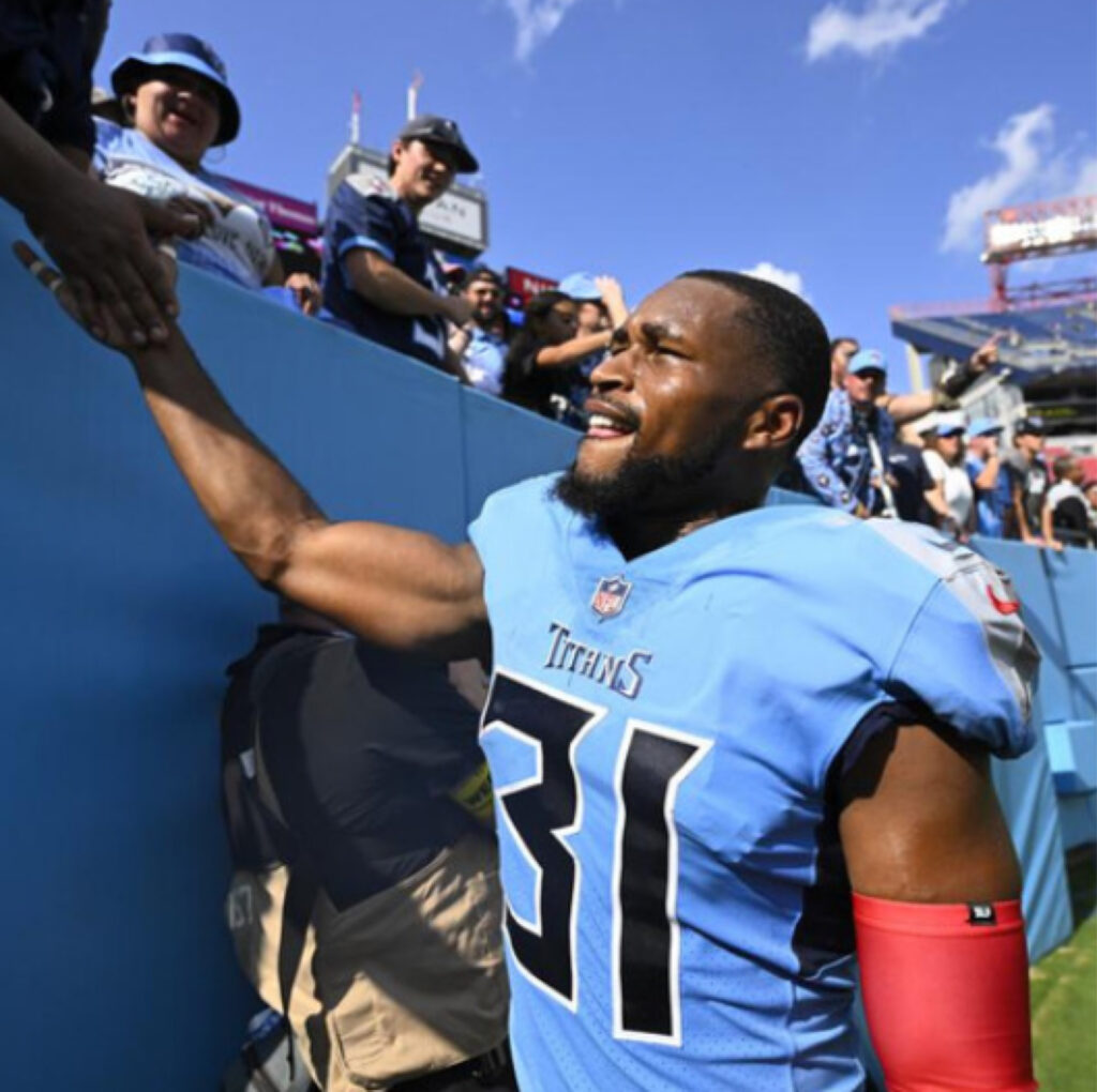 Titans Safety Kevin Byard high fives fans leaving Nissan Stadium Sunday after a win against the Raiders<br /> (AP Photo/John Amis) fox 17 wtz Nashville