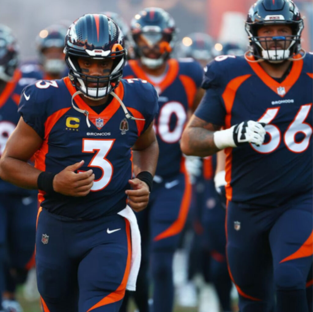 NLF Week 4 Preview Russel Wilson and the Broncos trudge onto the field. They will be taking on the winless Raiders Sunday<br /> Photo by Jamie Schwaberow/Getty Image