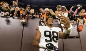 Isaac Rochell celebrates with fans