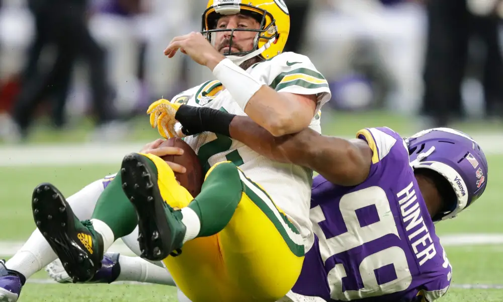 The Vikings defense sacks Aaron Rodgers four times in 23-7 win