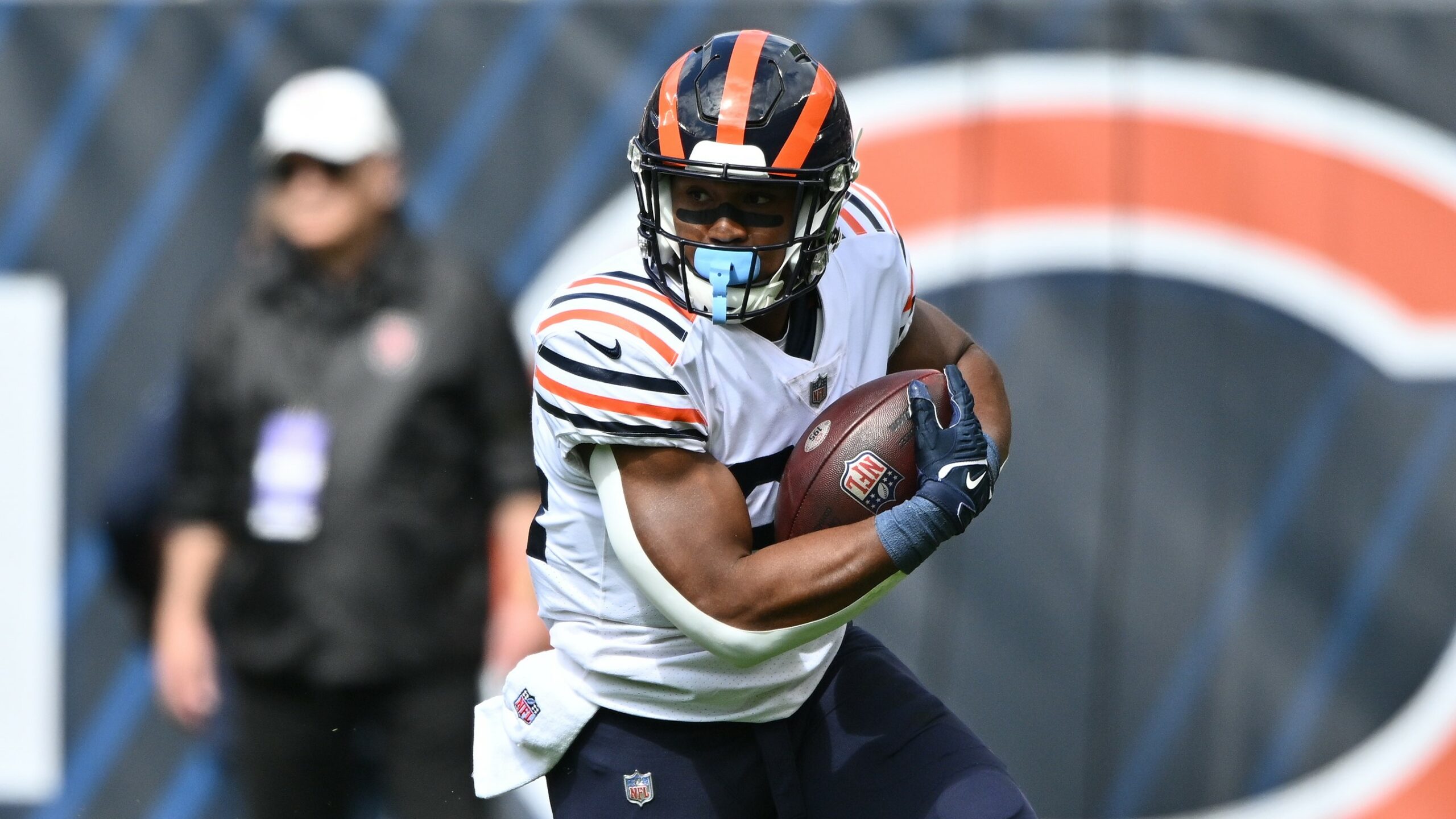 Sep 25, 2022; Chicago, Illinois, USA; Chicago Bears running back Khalil Herbert (24) looks for running room after catching a pass in the first quarter against the Houston Texans at Soldier Field. Mandatory Credit: Jamie Sabau-USA TODAY Sports